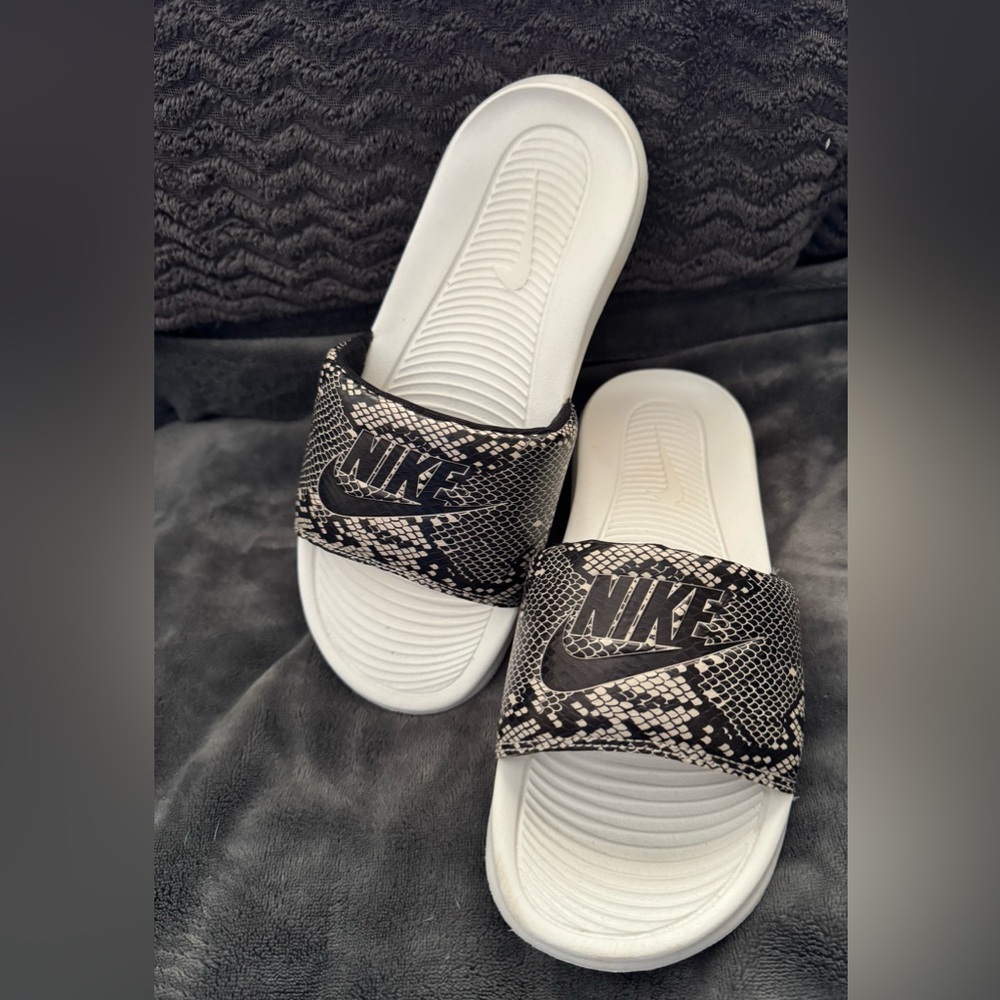 Nike python/white ladies slides. Size 7. Worn twice. $20.